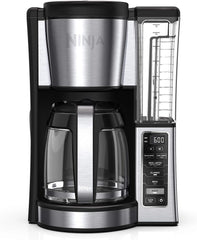 Programmable coffee machine, featuring two brewing modes, adjustable pre-heating plate and delayed brewing function